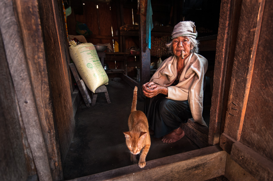 Tingguian Igorot woman in her home