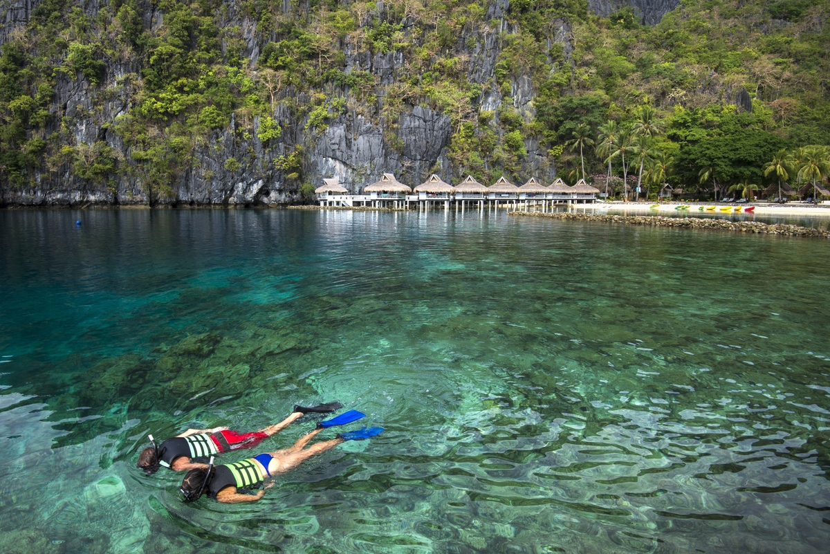Snorkelers at Miniloc Island Resort